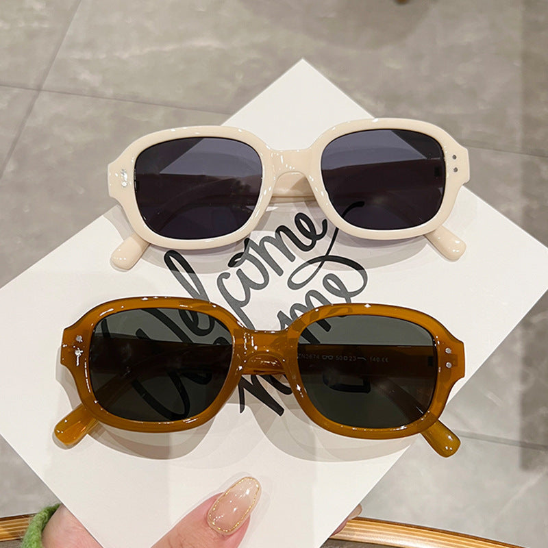 Damen modische solbrille med stor, firkantet ramme Skanto