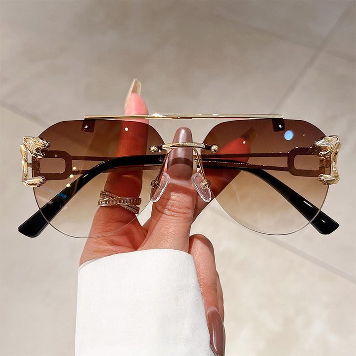 Women's unusual round sunglasses with decorative details Skanto