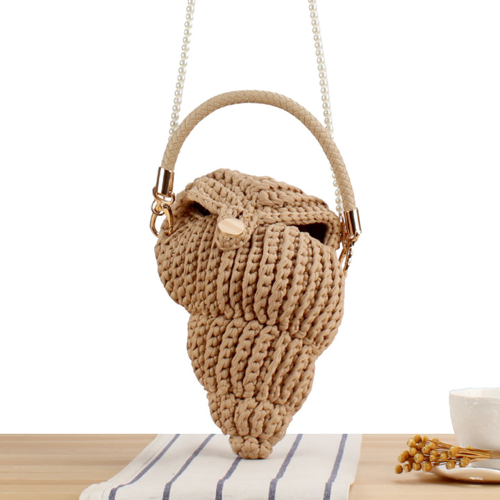Elegant håndveske i muslingdesign Skanto