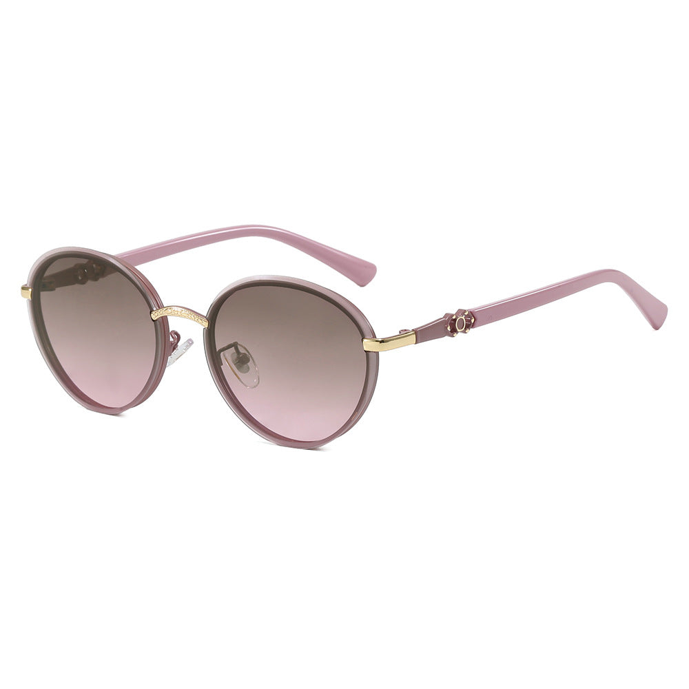 Dame elegant rund solbrille med speilende effekt Skanto