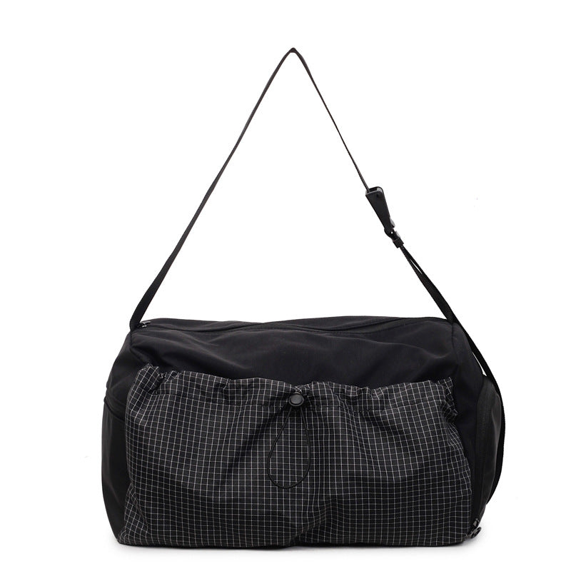 Romslig sport duffel bag med fleksibelt justerbart bæresystem Skanto