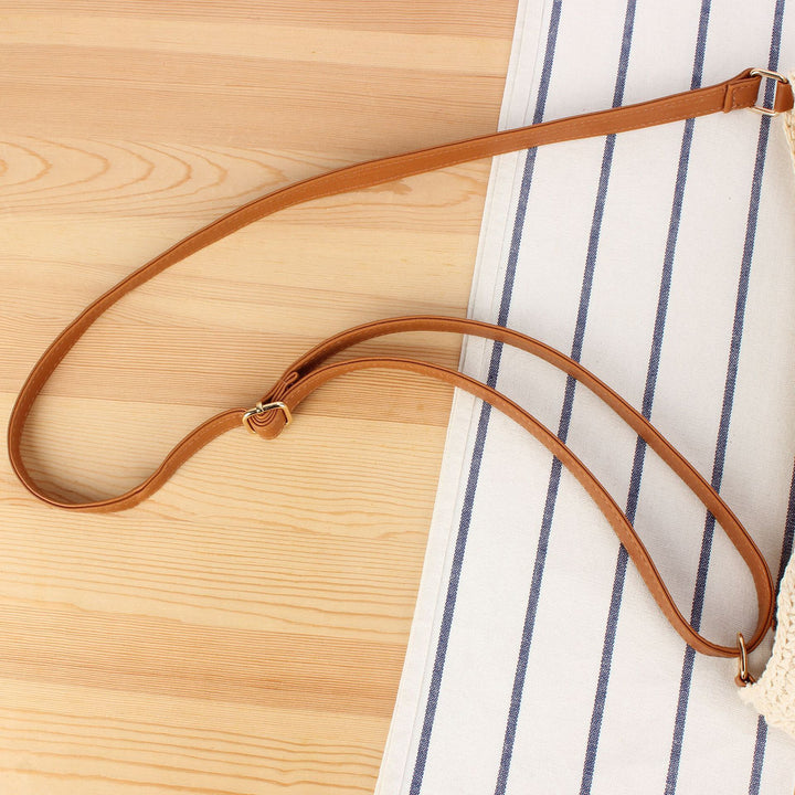 Handbag in hand-woven natural material with leather accents Skanto