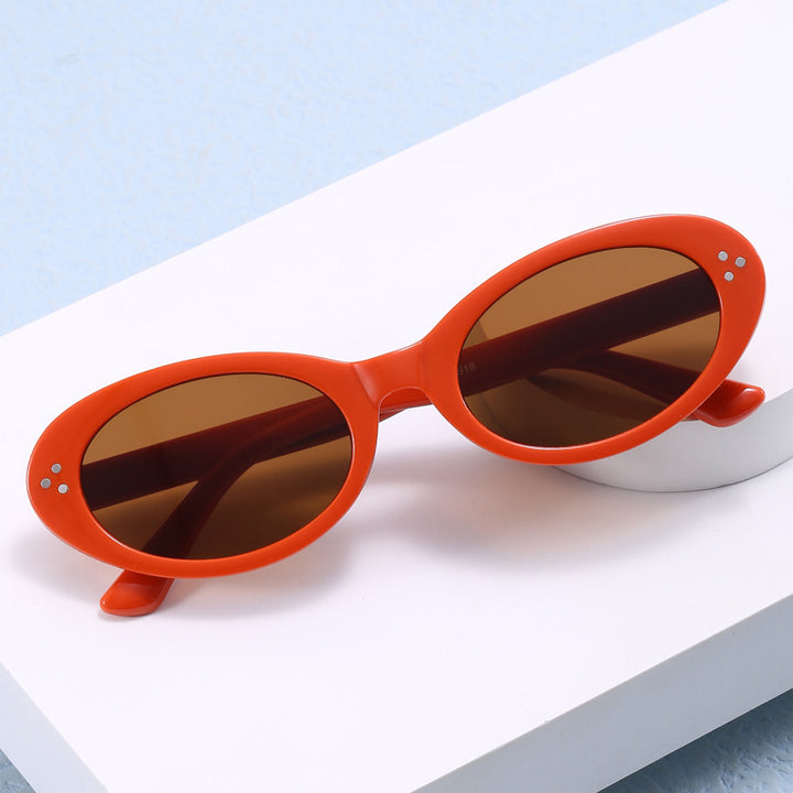 Damer moteriktig solbrille i elegant ovalt design Skanto