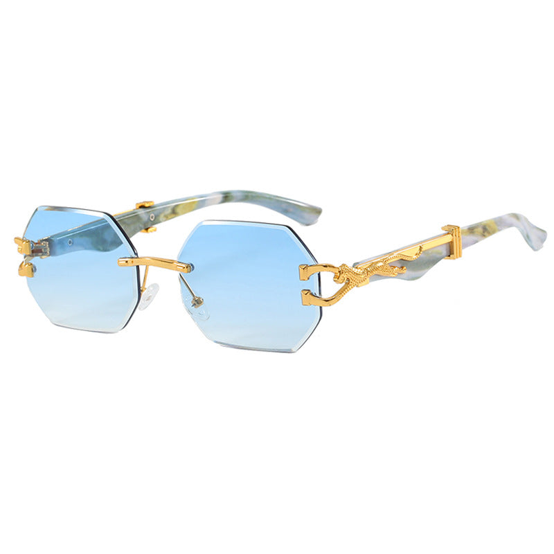 Women's fashionable sunglasses with extravagant octagonal design and gold accents Skanto