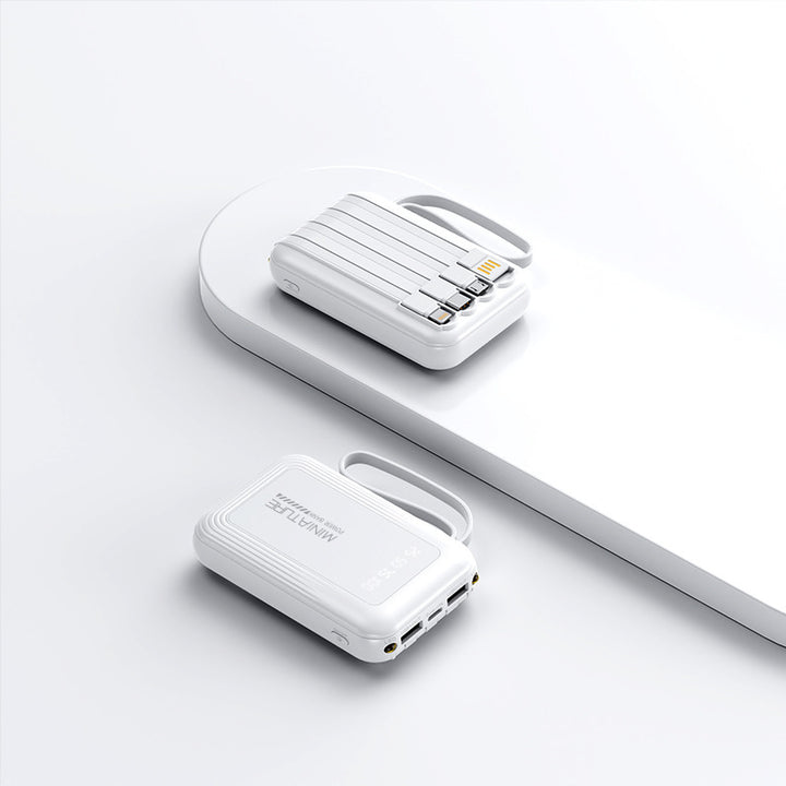 Praktisk Powerbank med trådløs hurtiglading og integrert kabelsystem Skanto