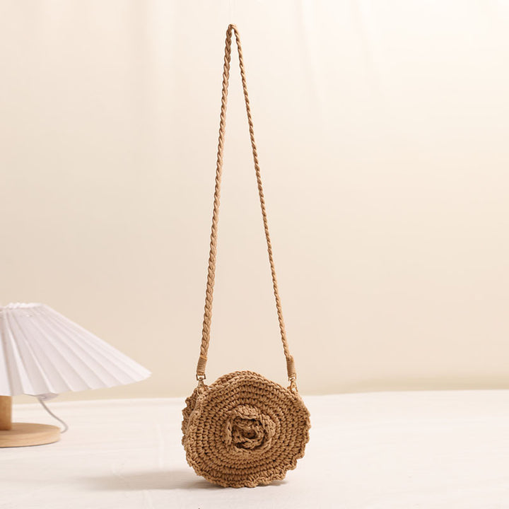 Hand-crocheted crossover bag with floral details Skanto