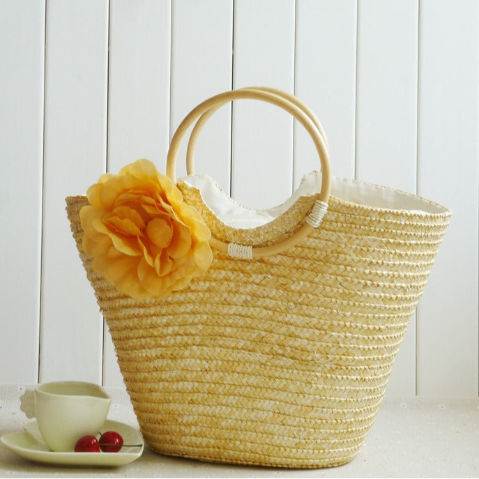 Elegant Straw Bag with Floral Accents Skanto