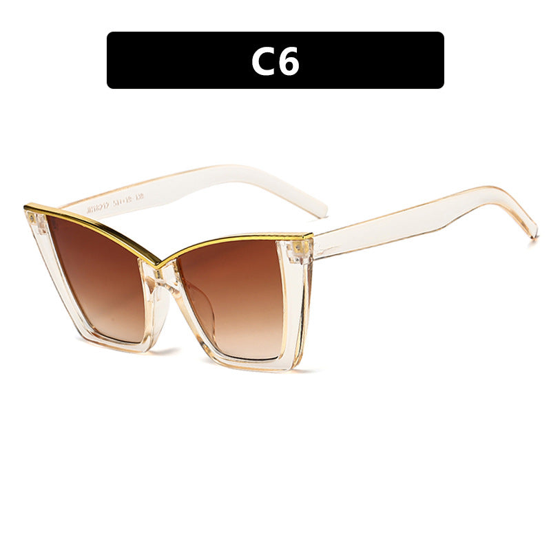 Dame ekstravagant solbrille med unik design og gullige aksenter Skanto