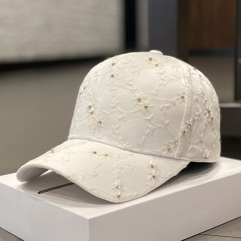 Kvinnebrodert baseball cap med rhinestones-detalj Skanto