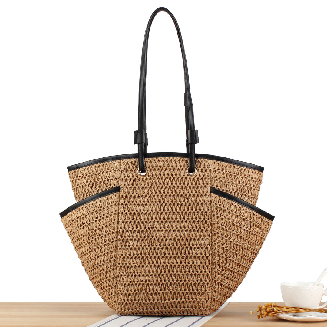 Tote bag with thoughtful compartment design and durable leather handles Skanto