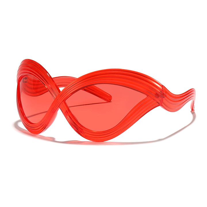 Dame moteriktig solbrille med innovativ bølkeramme Skanto