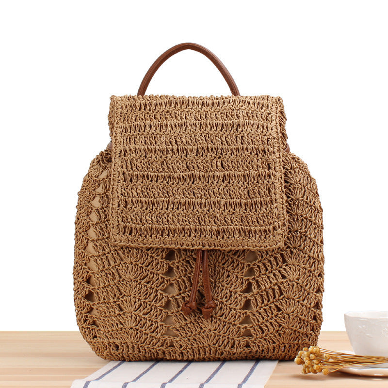 Backpack made of natural raffia with leather details Skanto