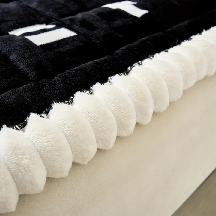 Skanto | Ruffled Cloud Edge Quilted Couch Cover