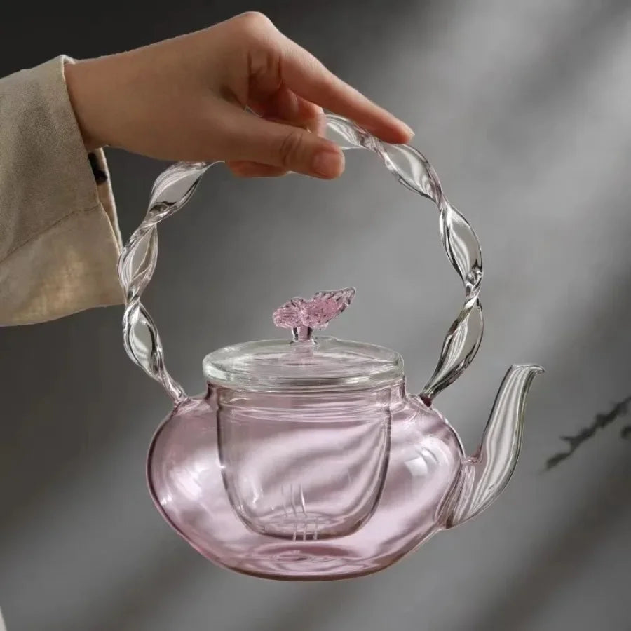 Tekanne med blomsterlokk og tesil