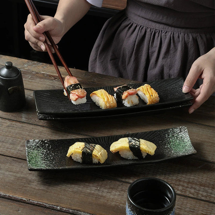 Minimalistiske sushi-tallerkener Skanto