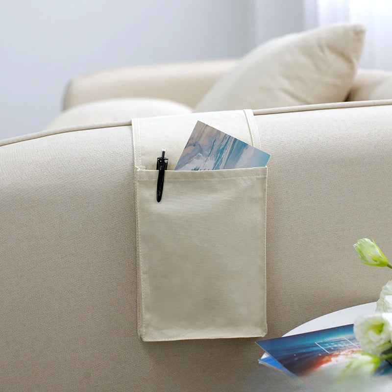 Norvo | Restivo Seng Organizer laget av bomull-linn | Hengende oppbevaring med lommer | For fjernkontroller, bøker og tilbehør – ca. 30×20×10 cm