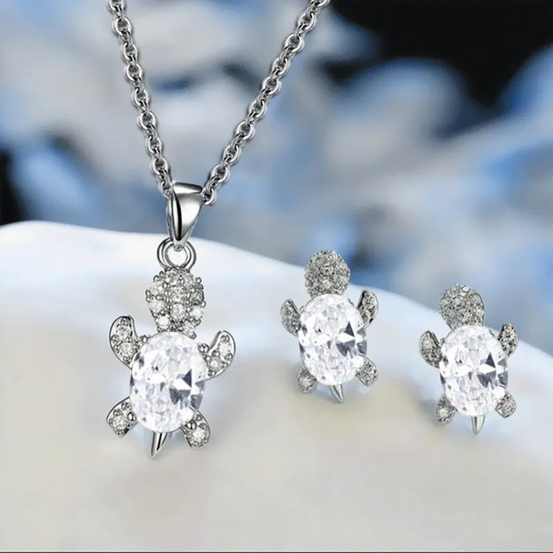 Skanto | Ocean Turtle Lucky Necklace Øredobbelsett