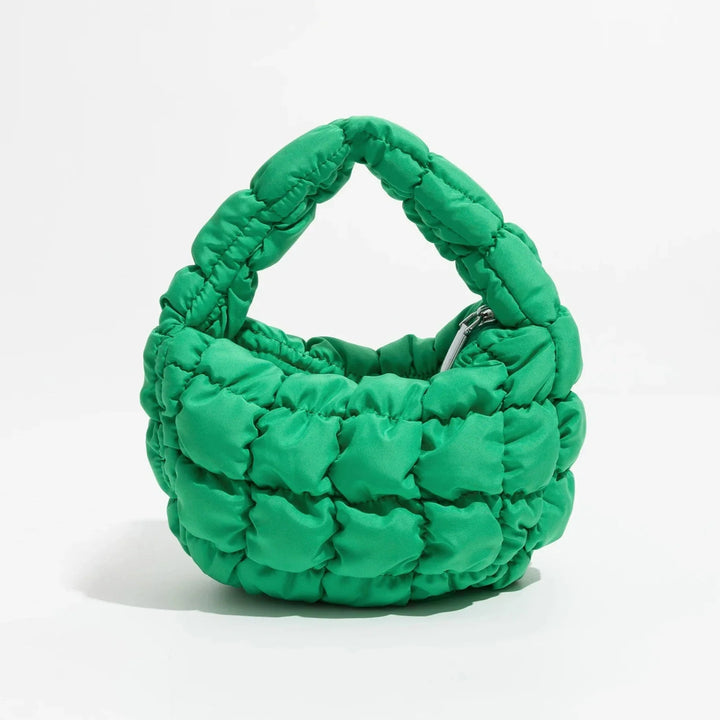 Skanto | Livlig quiltet rund mini bag