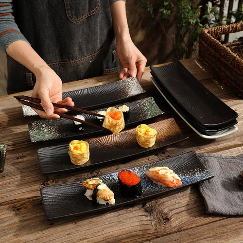 Minimalistiske sushi-tallerkener Skanto