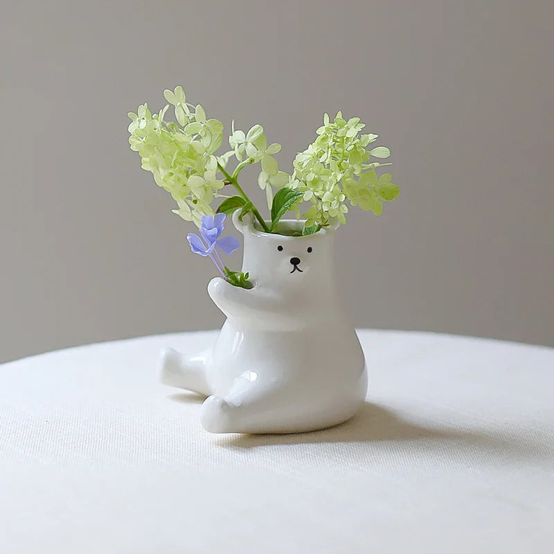 Bjørn med blomsterpotte | Skanto