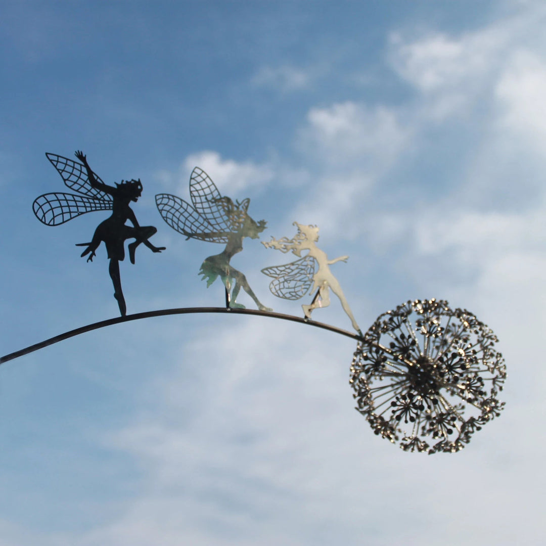 Feen på en melketråd kunstskulptur Skanto