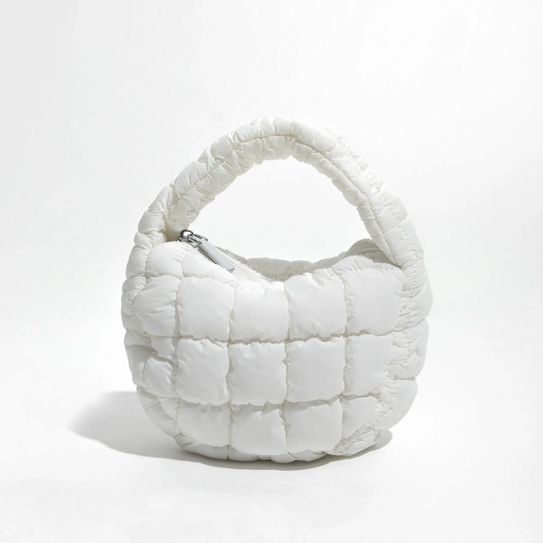 Skanto | Livlig quiltet rund mini bag