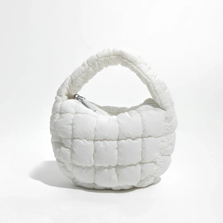 Skanto | Livlig quiltet rund mini bag
