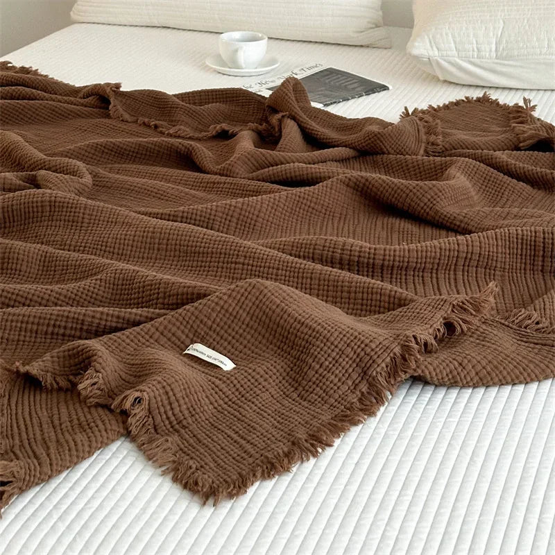 Skanto | Ensfarget bomull sofa teppe