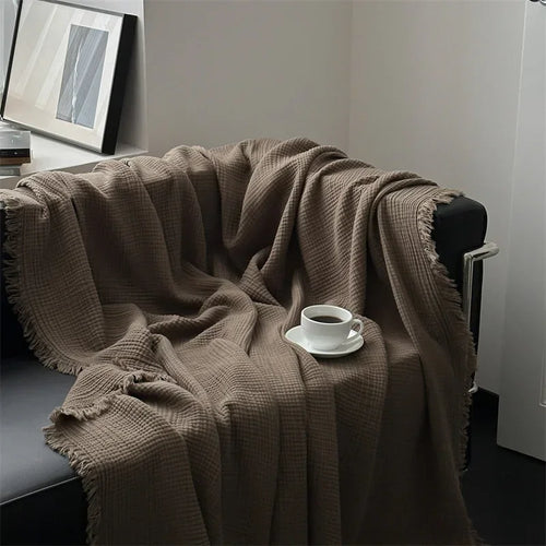 Skanto | Ensfarget bomull sofa teppe