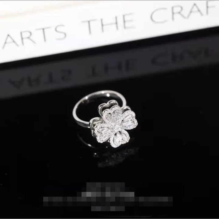Skanto | Roterende Blomst Zircon Klover Ring