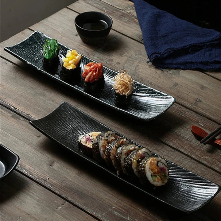 Minimalistiske sushi-tallerkener Skanto