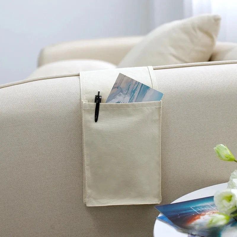 Norvo | Restivo Seng Organizer laget av bomull-linn | Hengende oppbevaring med lommer | For fjernkontroller, bøker og tilbehør – ca. 30×20×10 cm