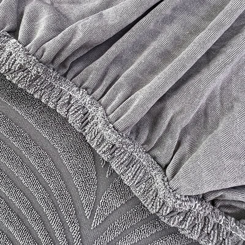 Skanto | PlushSecure - Elegant Jacquard Sofa Cover for Non-Slip Comfort
