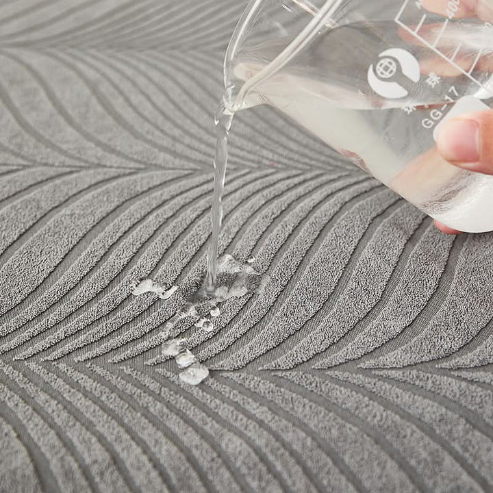 Skanto | PlushSecure - Elegant Jacquard Sofa Cover for Non-Slip Comfort