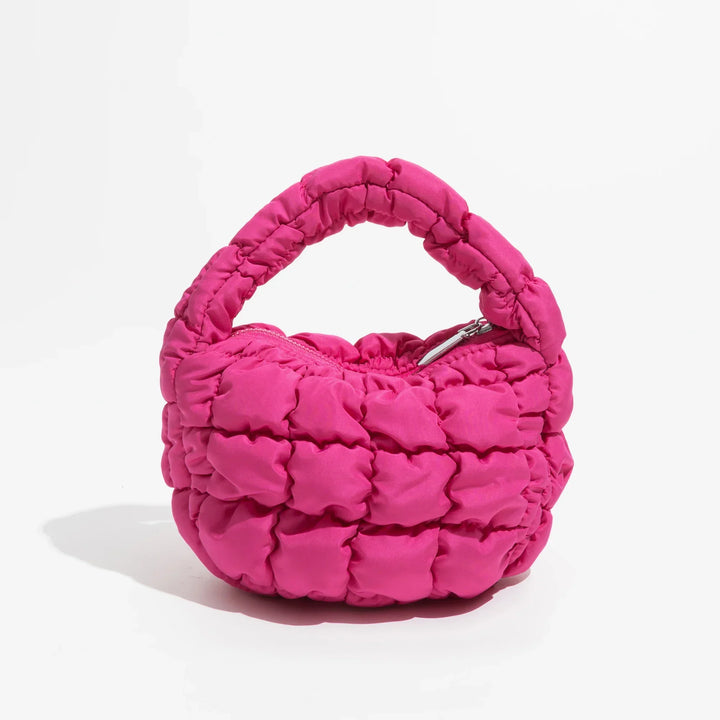 Skanto | Livlig quiltet rund mini bag