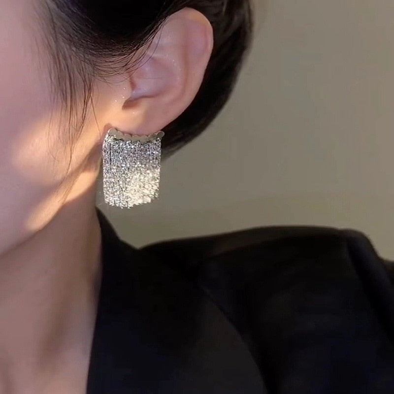 Norvo | Gylden Skinner By Frynse Øredobbe