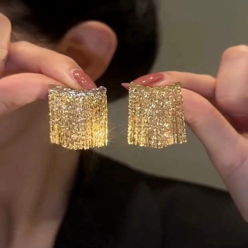 Norvo | Gylden Skinner By Frynse Øredobbe