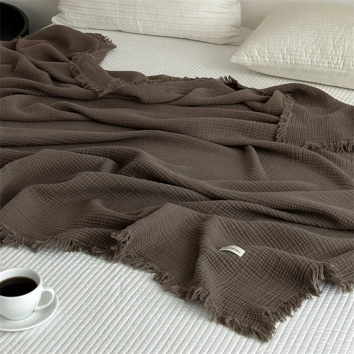Skanto | Ensfarget bomull sofa teppe