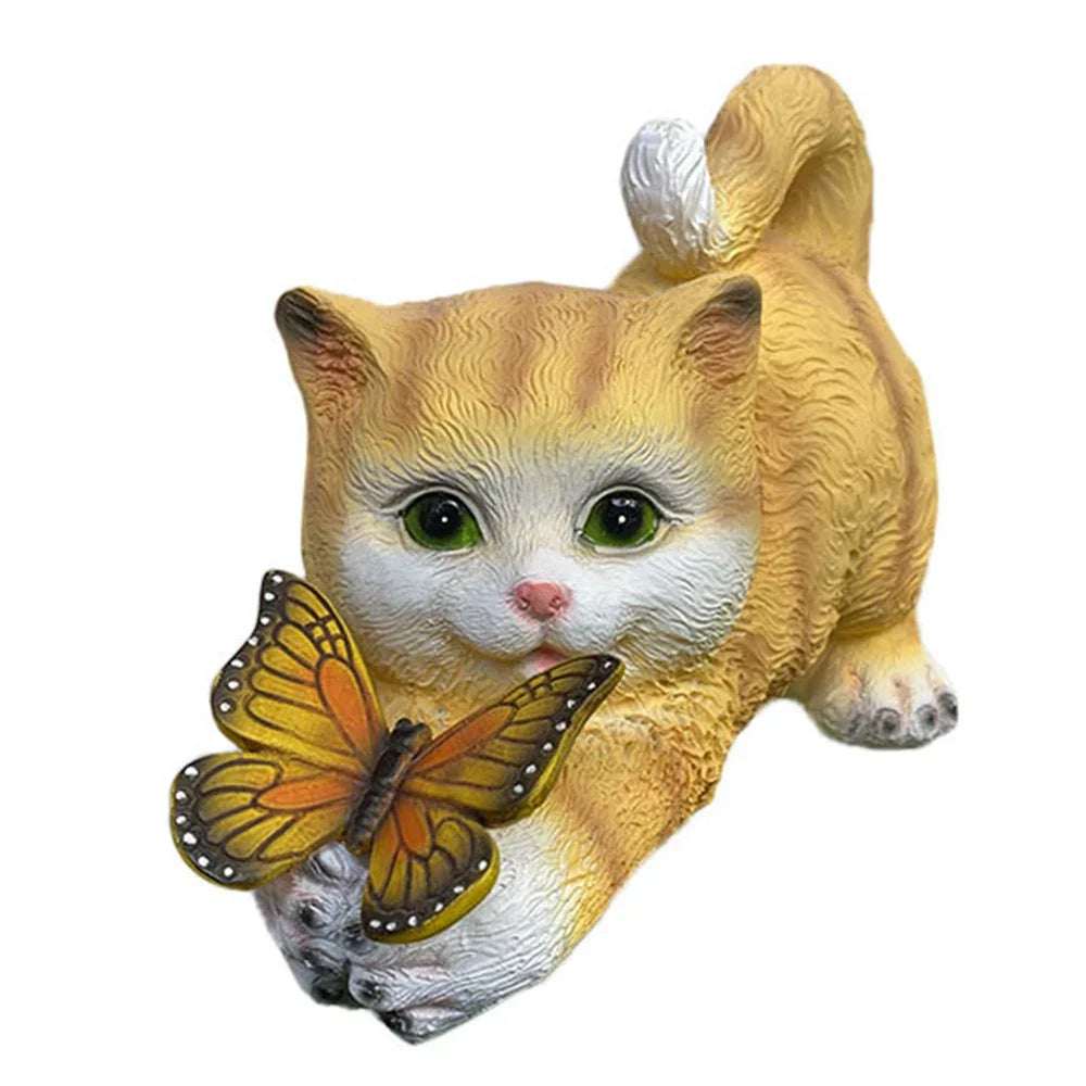 Skanto | Sommerfuglfangende katt Harpiks dekorativ lampe