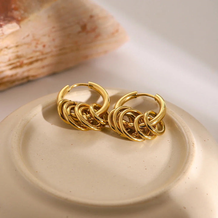 Skanto | Delikat Huggie Hoop Spiral Øredobber