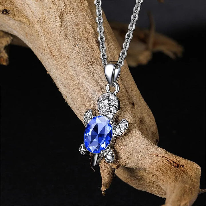 Skanto | Ocean Turtle Lucky Necklace Øredobbelsett