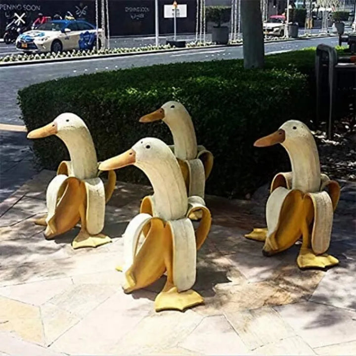 Bananenenten-Dekofigur – Verspielte Harzdekoration für drinnen und draußen