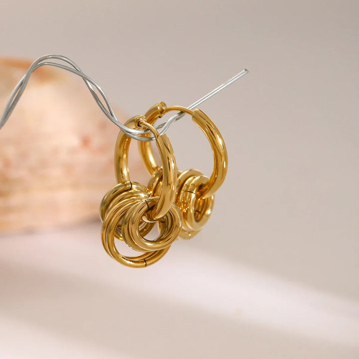 Skanto | Delikat Huggie Hoop Spiral Øredobber
