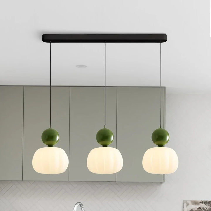 Skanto | Glasscharms med en gyllen akcent av luksus