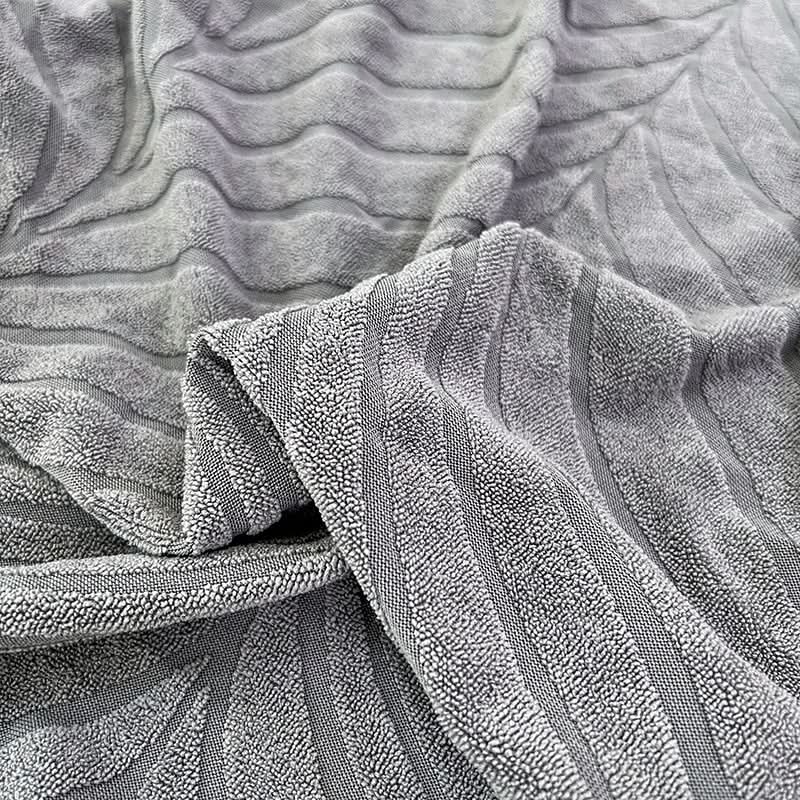 Skanto | PlushSecure - Elegant Jacquard Sofa Cover for Non-Slip Comfort