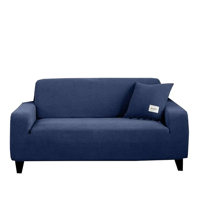 Skanto | CushionWrap - Elastisk, halkefri sofatrekk