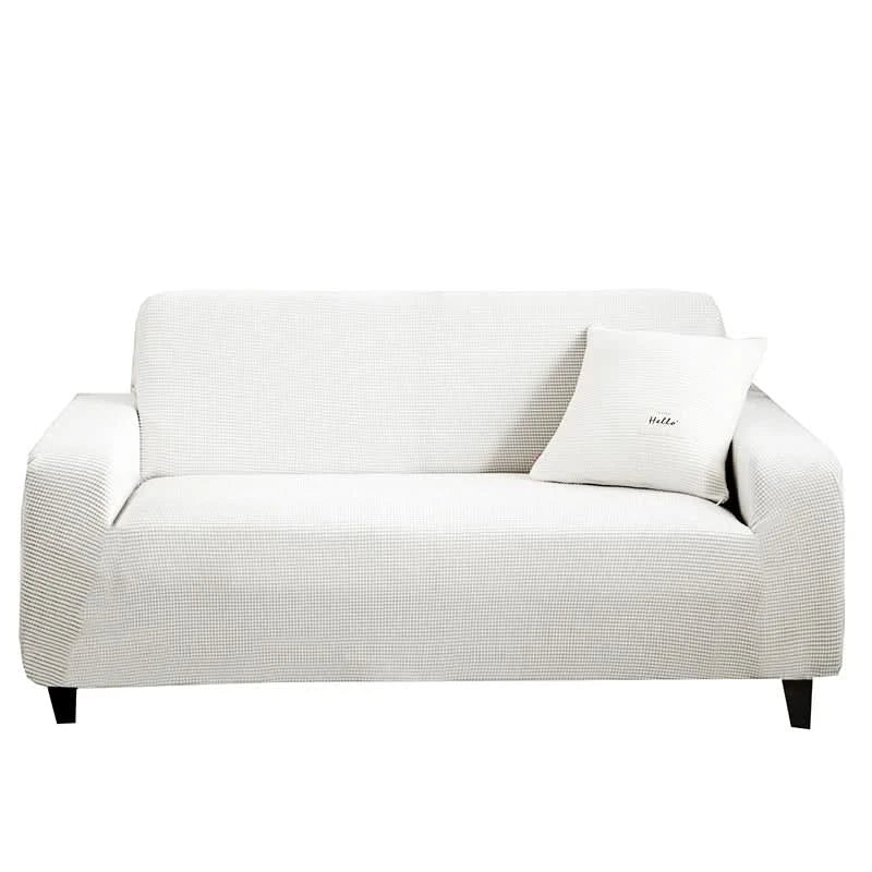 Skanto | CushionWrap - Elastisk, halkefri sofatrekk