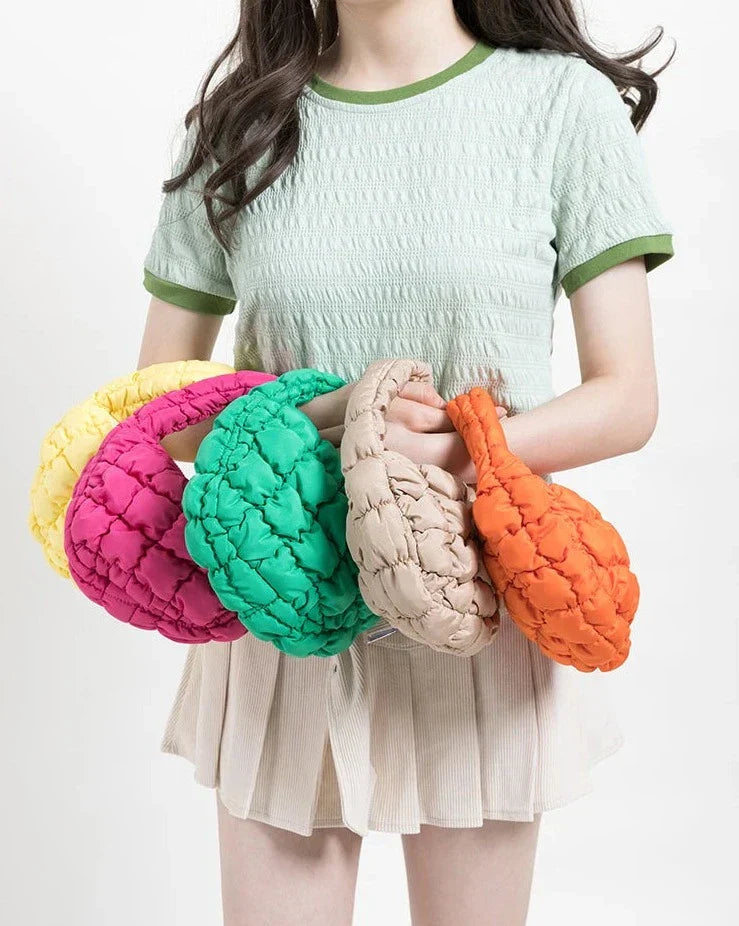 Skanto | Livlig quiltet rund mini bag