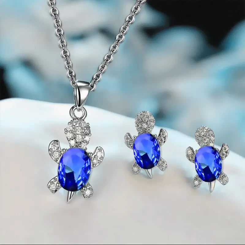 Skanto | Ocean Turtle Lucky Necklace Øredobbelsett