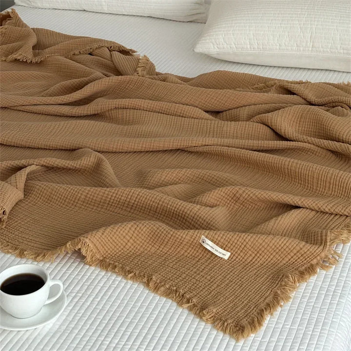 Skanto | Ensfarget bomull sofa teppe